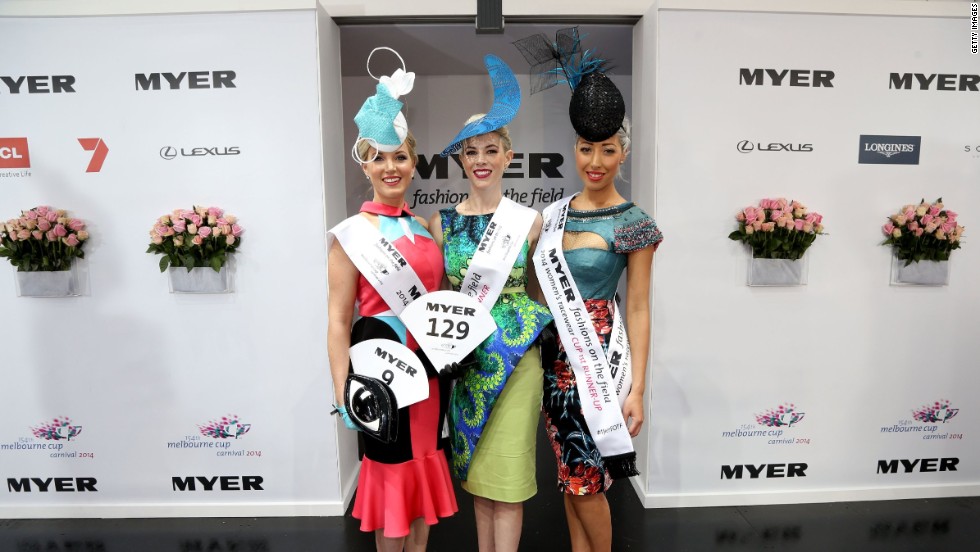 Myer Fashions on the Field Women&#39;s Racewear Daily Finalists, second runner up Laura Moss, winner Christine Spielmann and first runner up Milano Imai pose in the Fashion on the Field enclosure.