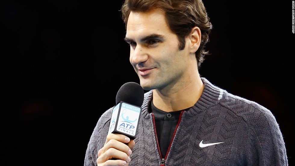 Federer tells fans he has had to pull out of the title match against Djokovic with a back problem.
