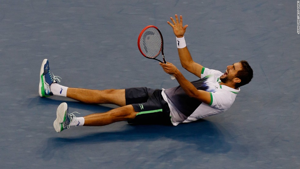 Cilic falls to the floor in joy after defeating Japan&#39;s Kei Nishikori to win the U.S. Open in September. 