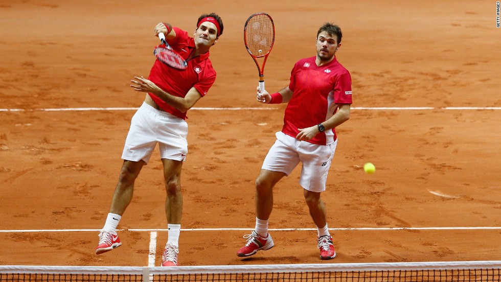Federer and Wawrinka won their doubles match Saturday to come within one rubber of a historic first for Switzerland.