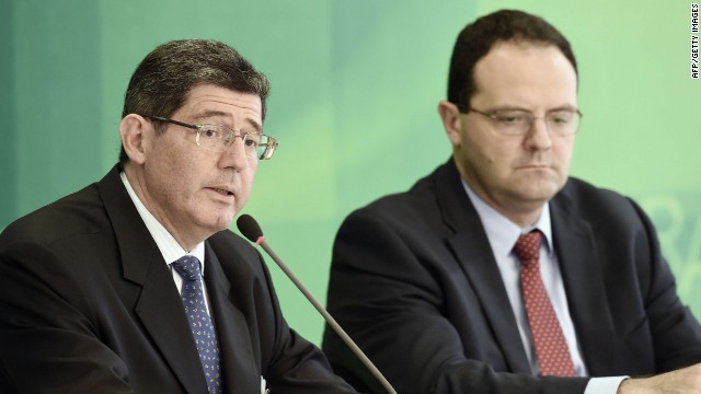 The new ministers of Finance, Joaquim Levy (R) and Planning, Nelson Barbosa (L) during a press conference at Planalto Palace in Brasilia, on November 27, 2014. Levy will replace Guido Mantega and Barbosa will replace Mirian Belchior respectively. AFP PHOTO/EVARISTO SAEVARISTO SA/AFP/Getty Images