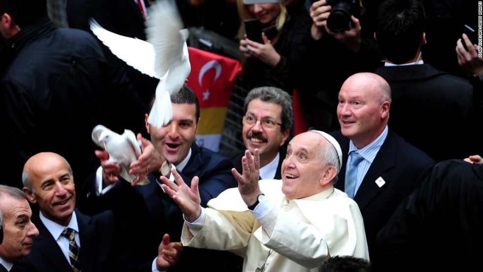 Pope Francis releases a dove at Istanbul&#39;s Holy Spirit Cathedral on November 29.