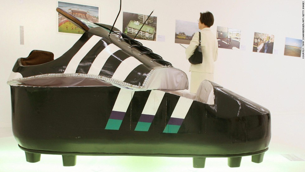 A coffin from Ghana which is shaped as a soccer shoe is presented in the exhibition &#39;Football: One Game - Many Worlds&#39; in Munich&#39;s Stadtmuseum in 2006. 