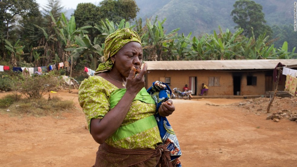 Local woman Rose Sirri gets a tastes of fresh product. Fumsi says: &quot;(Beekeeping) is totally good for them. They get the bees themselves, they get the money, they are able to do their own thing on their own without depending on the man. Even though it&#39;s a small amount.&quot; 