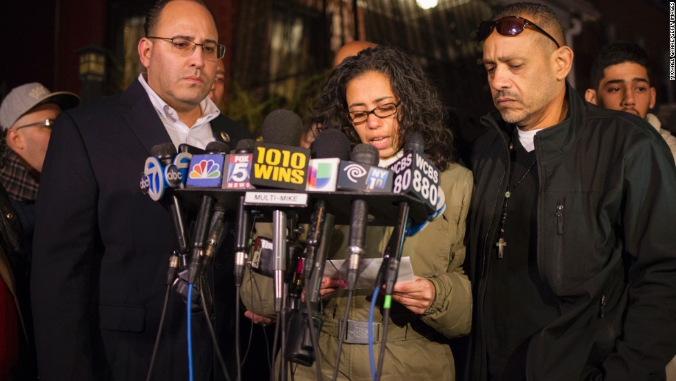 Lucy Ramos, aunt of slain police officer Rafael Ramos, speaks at a news conference in front of Ramos&#39; childhood home on December 21.