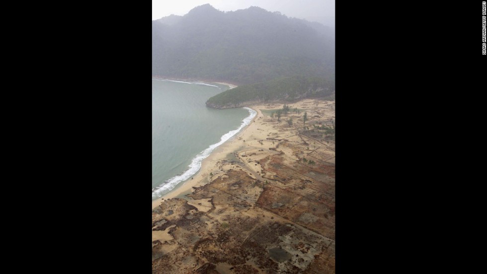 An aerial shot shows devastation caused by the Indian Ocean tsunami to the west of Aceh on January 8, 2005, in Banda Aceh, Indonesia. Indonesia, Thailand and Sri Lanka were the countries most affected by the December 26 earthquake-tsunami. 