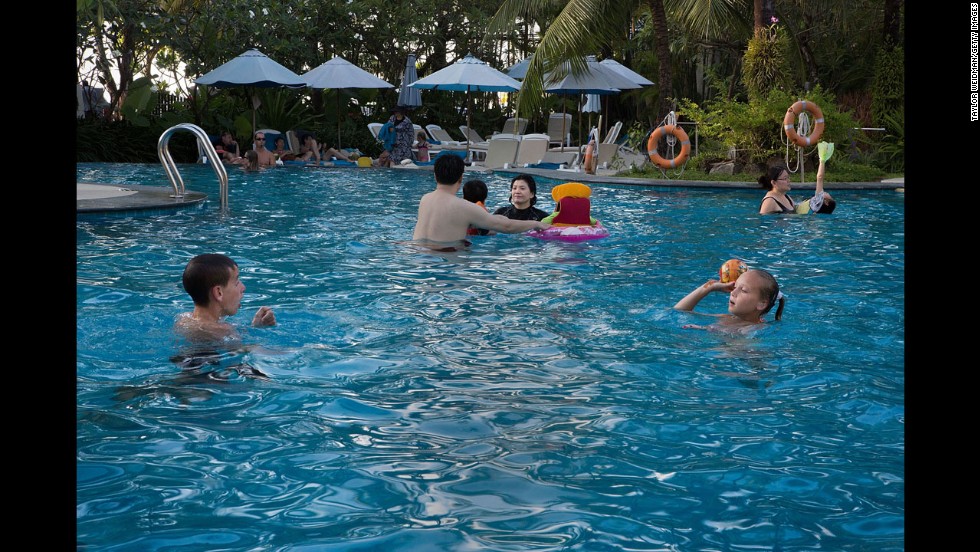 Children play in the renewed pool at the Holiday Inn Phuket Resort and Hotel on December 10, 2014.