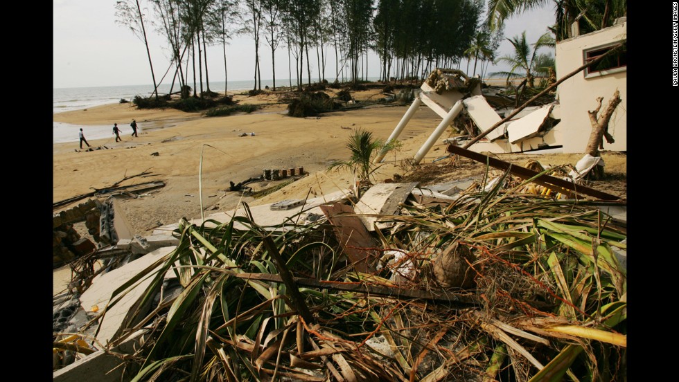 Debris and collapsed buildings are seen on December 29, 2004, at the Theptharo Resort in Khao Lak, where many tourists died when their bungalows were swept away by the tsunami.