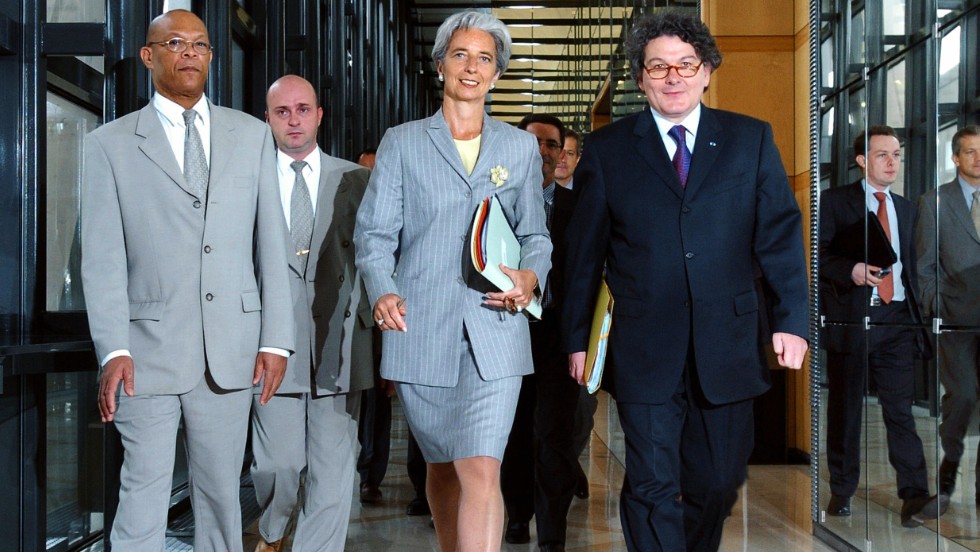 In June 2005, Lagarde joined the French government as Minister for Foreign Trade under French President Jacques Chirac. &lt;br /&gt;She is seen here with French Minister of Economy Thierry Breton (R) arriving at a press conference in Paris, France. 