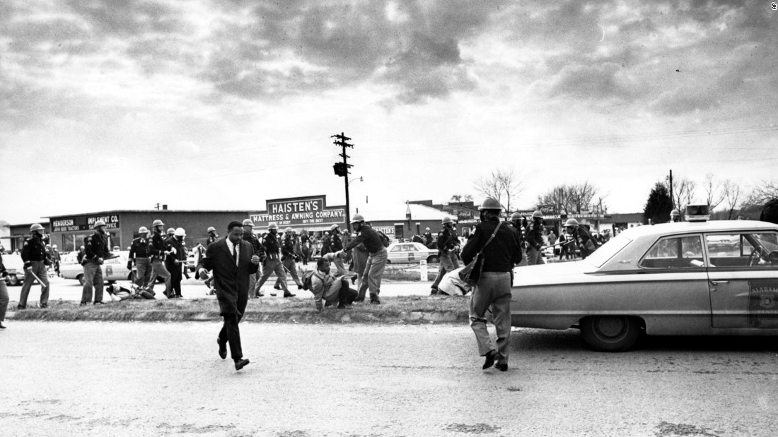 Civil rights leaders Hosea Williams (wearing a suit) and John Lewis (on the ground) led the march on that Sunday afternoon. Lewis, who has been a congressman from Georgia since being elected in 1986, was badly injured in Selma, suffering a fractured skull after being beaten by troopers.