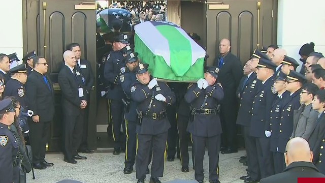 nypd-officer-laid-to-rest-after-tender-tense-funeral-cnn