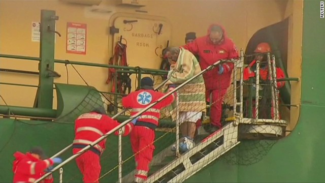 Burning ferry passengers arrive in Italy