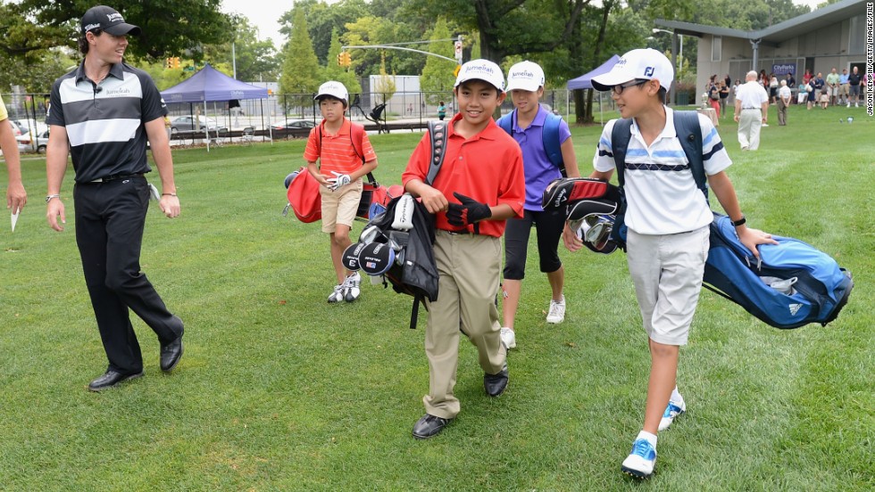 Rory McIlroy (left) hosts a junior golf clinic in New York in 2012. The world No. 1 is an ambassador for junior golf  -- a role that could be vital in keeping the younger generation interested in the sport.  