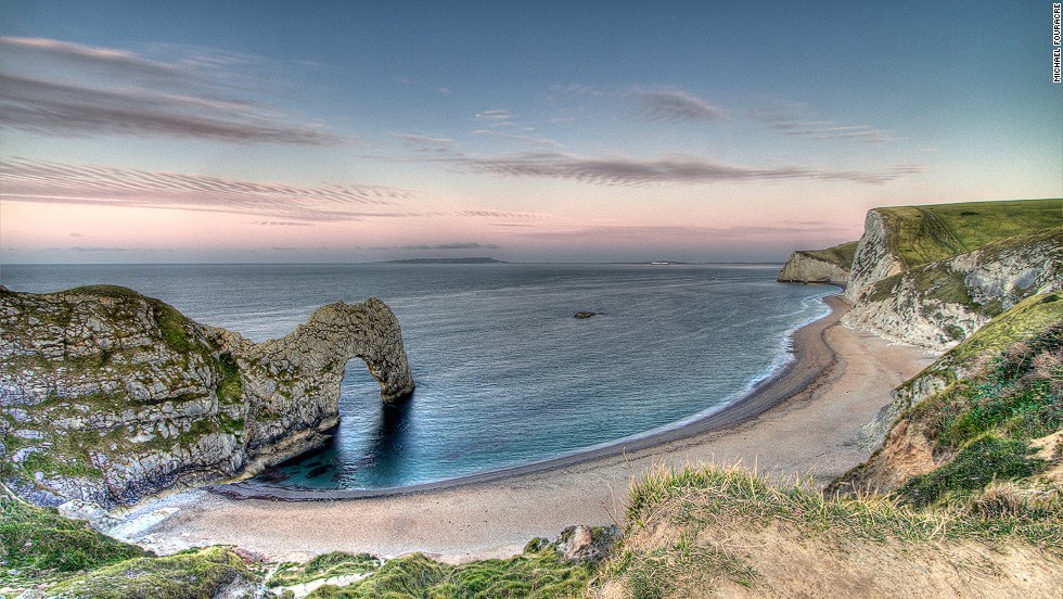 Featuring 240-million-year-old rocks, the South West Coast Path&#39;s prehistoric UK cliffs feature spectacular formations like Durdle Door and Ladram Bay. 