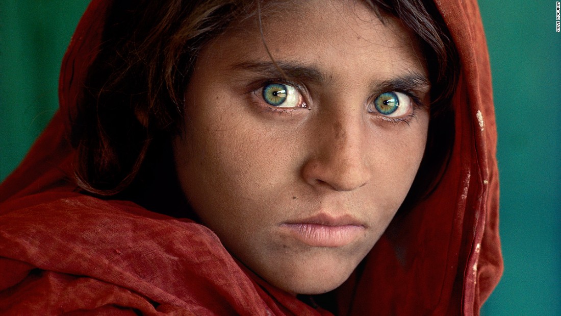Afghan Girl' from National Geographic magazine cover granted refugee status  in Italy - CNN Style