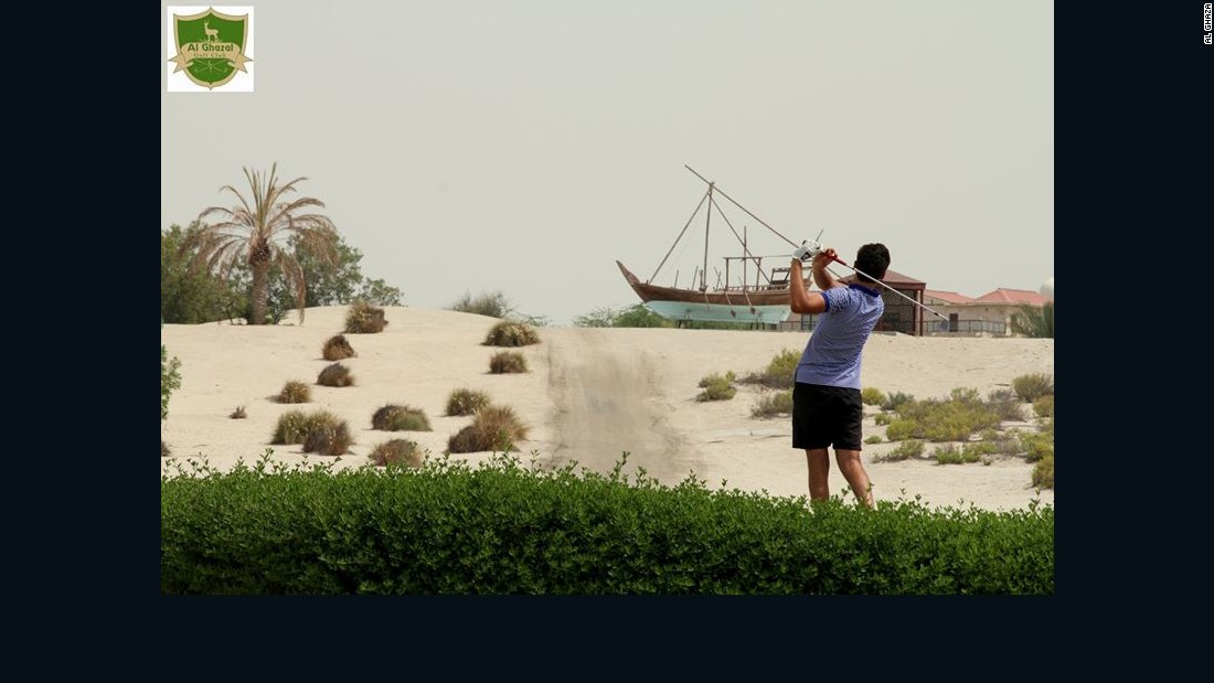 A player takes aim on the Al Ghazal course in Abu Dhabi, regarded by some experts as a world class sand course.