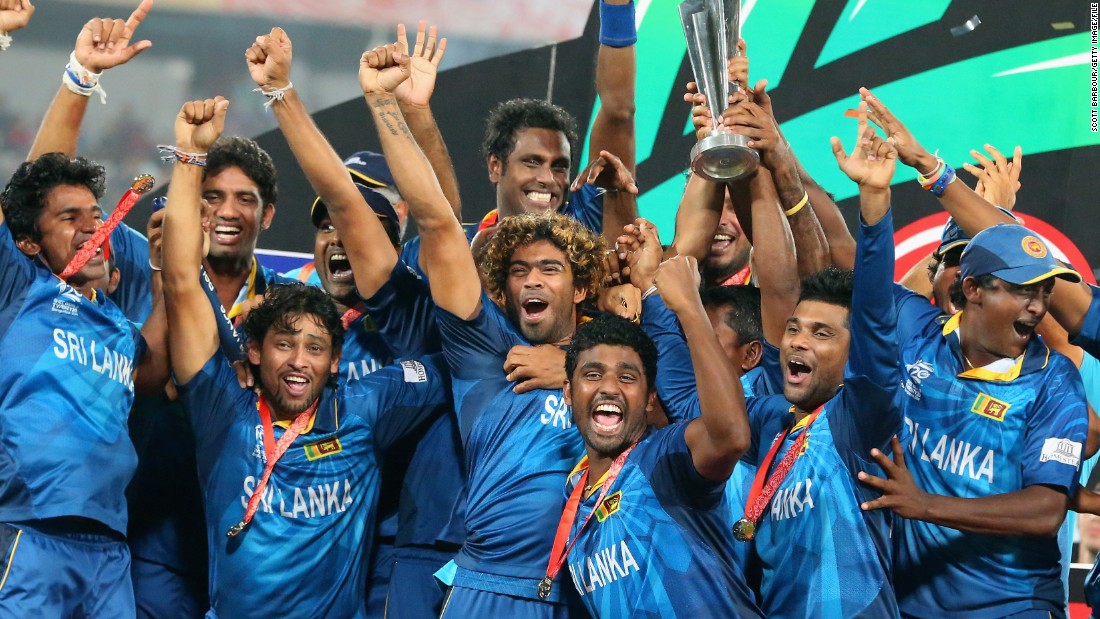 The shortened form of cricket that encourages batters to hit big has drawn large crowds. Here Lasith Malinga of Sri Lanka and his team celebrate winning the 2014 World Cup trophy in Dhaka, Bangladesh.