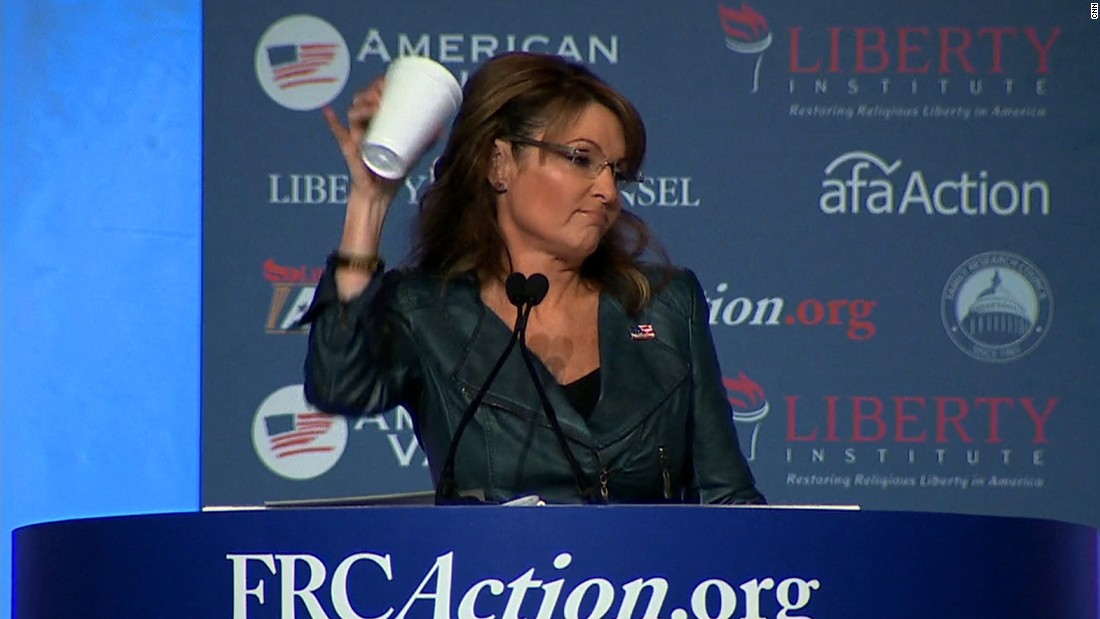 Palin takes a jab at President Barack Obama in September, mocking his &quot;coffee cup salute&quot; moment. Obama drew criticism after the White House posted a video to Instagram featuring him walking off Marine One offering a less-than-formal salute with a coffee cup in hand.