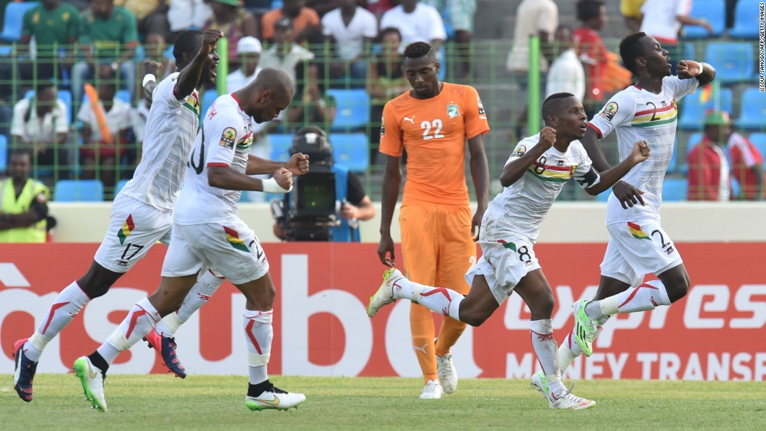 Guinea&#39;s players celebrate after scoring a goal against Ivory Coast during the African Cup of Nations group D tie on Tuesday. The match finished 1-1.   