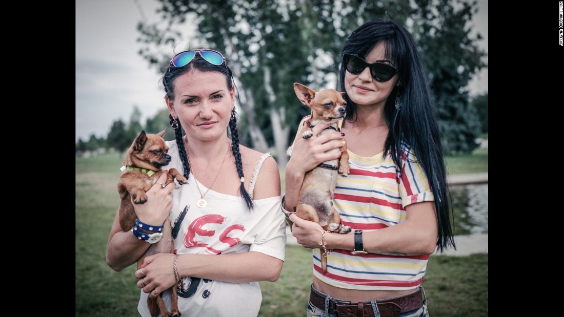 Ukranian women pose with their dogs in Cherkasy.