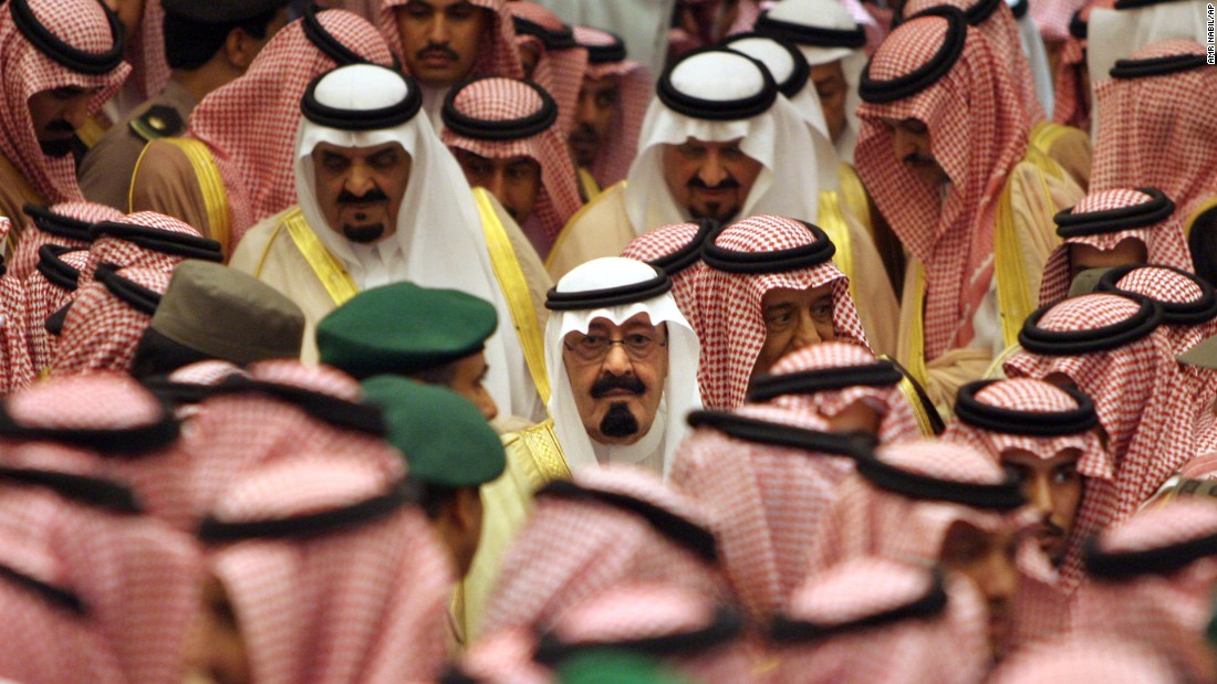 King Abdullah is surrounded by hundreds of Islamic clerics, tribal chiefs and other prominent Saudis before a ceremony bestowing his legitimacy in August 2005.