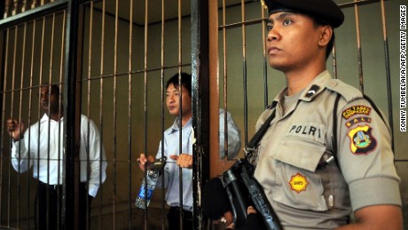 Australians Myuran Sukumaran, left, and Andrew Chan, center, part of the &quot;Bali Nine&quot; await trial in 2010 in Bali. 