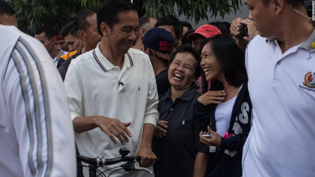 In a country long ruled by aloof presidents with ties to the military and the elite, people in Jakarta were positively giddy to see their president among them.&lt;br /&gt;Jokowi&#39;s security team allowed the President to be jostled by young and old elbowing in for a handshake.