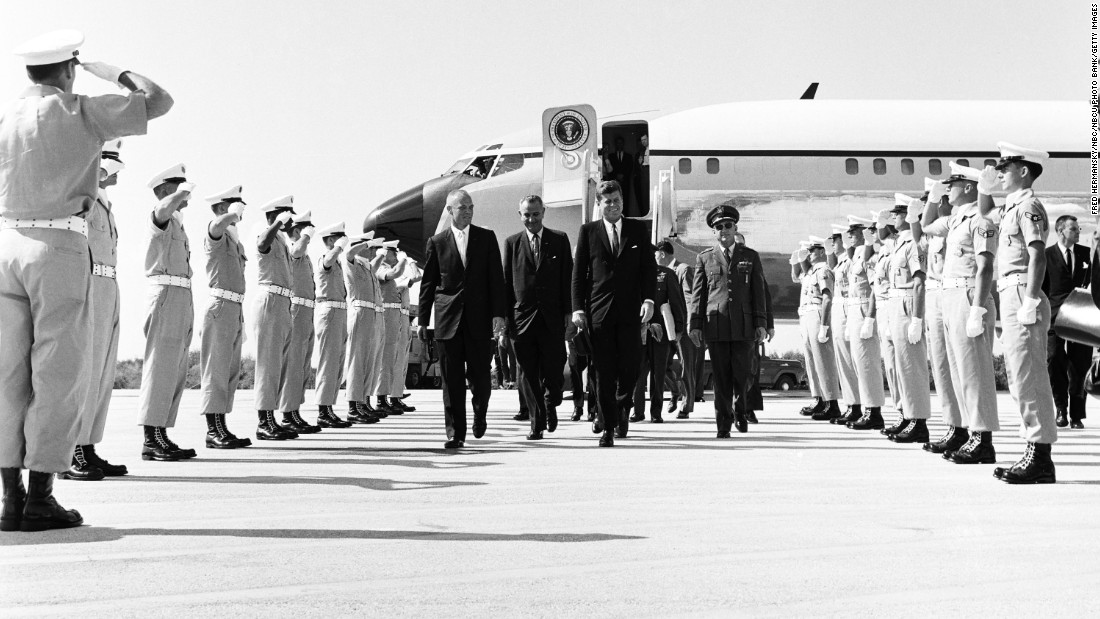 From left, astronaut John Glenn, Vice President Lyndon B. Johnson, and President John F. Kennedy arrive at Cape Canaveral Air Force Station in February 1962. Kennedy was the first president to use a customized Boeing VC-137C as Air Force One. The plane was a military version of the Boeing 707. Code-named &quot;SAM 26000,&quot; this jet served presidents for more than three decades.