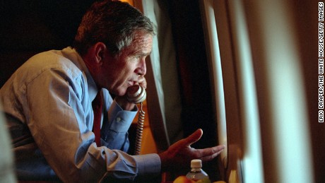 President George W. Bush speaks to Vice President Dick Cheney by phone aboard Air Force One on September 11, 2001.