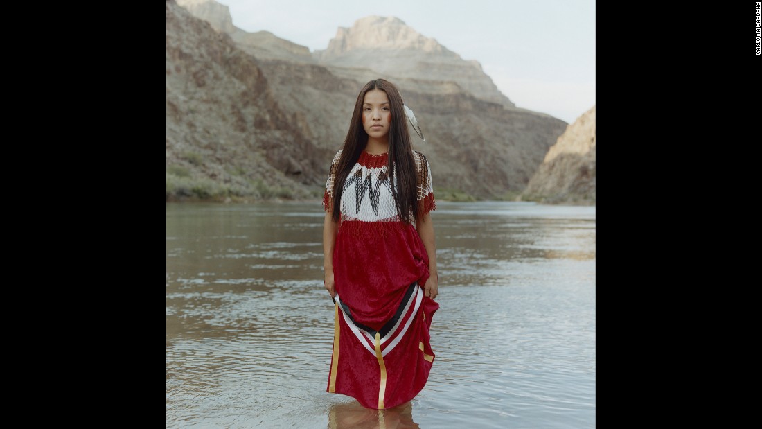 Sage Honda, a 22-year-old from Peach Springs, Arizona, wears a handmade dress at the Grand Canyon, a sacred site of the Hualapai people. Since appearing in Miss Native American USA, she has been encouraging Native youth to travel off the reservation to explore more opportunities. &quot;I want to be a role model to show my community and youth that it is possible to come off our land and do big things,&quot; she said in the &quot;Red Road&quot; photo series.