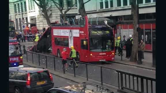 Roof torn off London bus after collision with tree - CNN