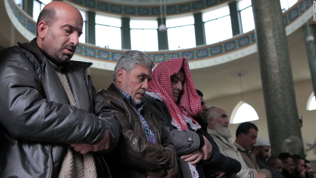 People in Amman pray for al-Kasasbeh on Wednesday, February 4.