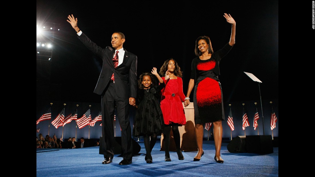 Obama stands on stage in Chicago with his family after winning the presidential election on November 4, 2008.