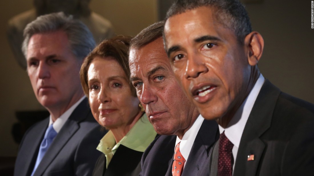 From left, House Majority Leader Kevin McCarthy, House Minority Leader Nancy Pelosi and House Speaker John Boehner listen as Obama speaks during a meeting in the Cabinet Room of the White House on January 13, 2015. 