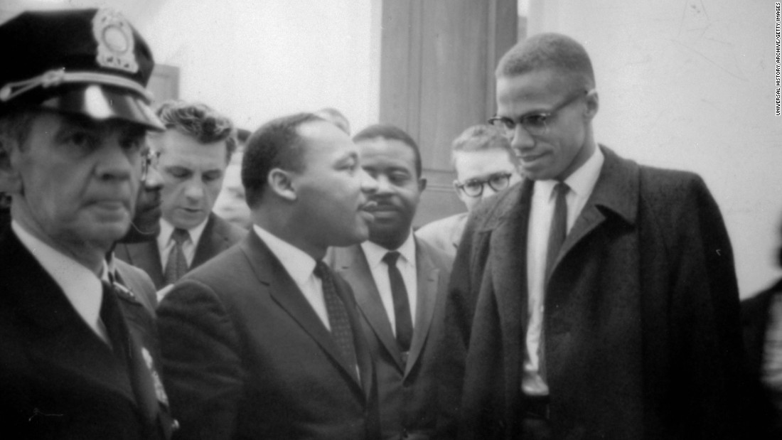 Malcolm X meets with Martin Luther King Jr. in March 1964.