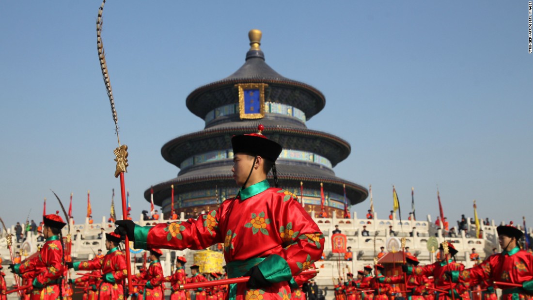 Chinese performers re-enact a traditional Qing Dynasty ceremony on Saturday, February 14, in which emperors prayed for good fortune at the Temple of Heaven in Beijing.