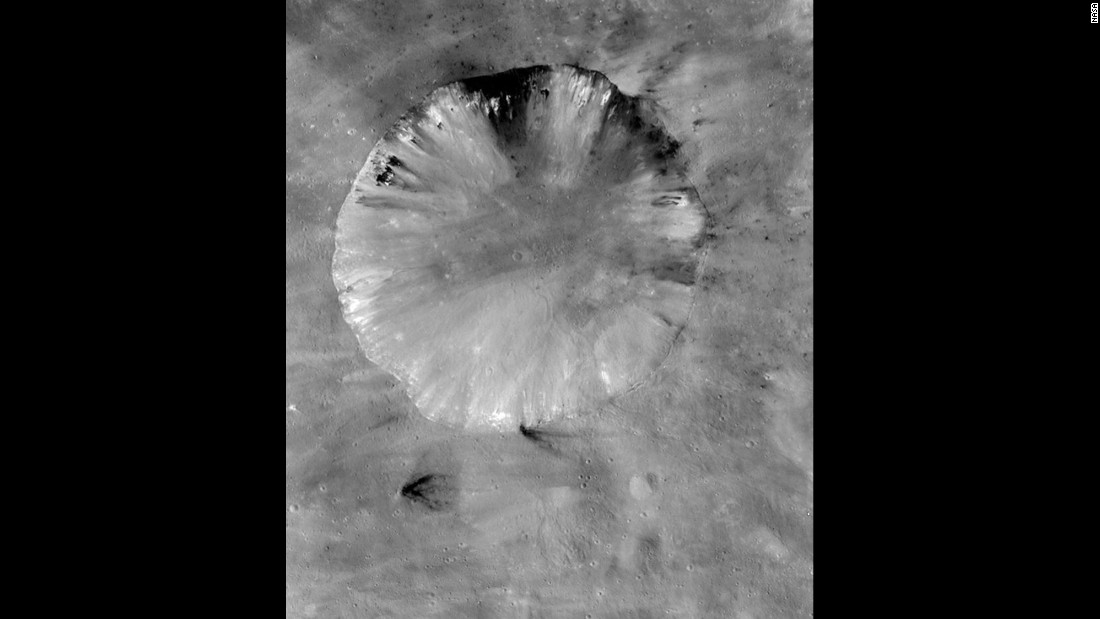 This is Vesta&#39;s Numisia crater. It&#39;s about 19 miles (31 kilometers) in diameter. 