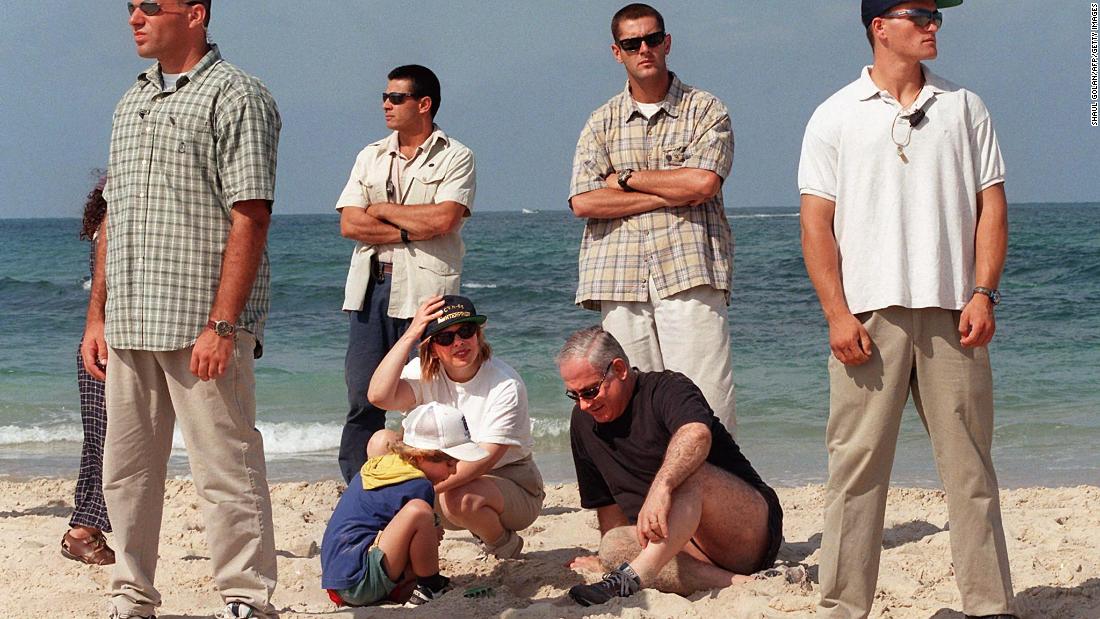 Netanyahu spends the day on the beach with his wife, Sara, and son Avner in Caesarea, Israel, in August 1997. 