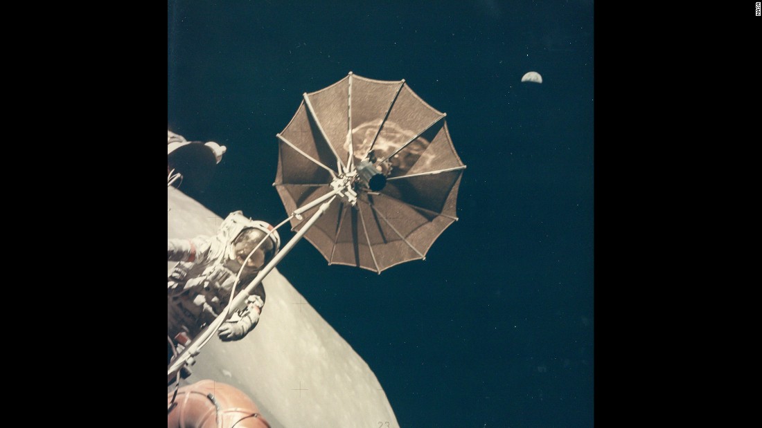 Earth is seen above Eugene Cernan and the antenna of the lunar rover during Apollo 17 in December 1972. It was the final mission of the Apollo program. &quot;I thought about it when we left the surface,&quot; Cernan said. &quot;I just felt it might very well be a generation before we get back to the moon. I&#39;m probably going to be proven to be right.&quot;