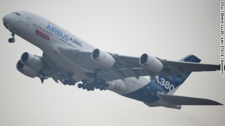 An Airbus A380 plane performs at the Airshow China 2014.