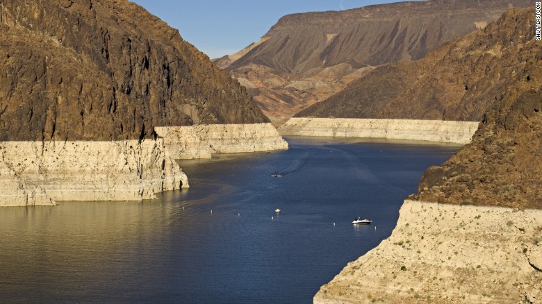 As water drains from Lake Mead, a "bathtub ring" of minerals is left on the shore, showing its decline. The height of the ring in June was roughly the size of the Statue of Liberty without its base.