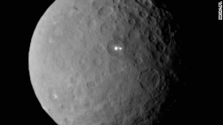 NASA's Dawn spacecraft took this image of dwarf planet Ceres on February 19, 2015 from a distance of nearly 29,000 miles (46,000 kilometers). A bright spot with a dimmer companion spot can be seen. They appear to be in the same basin. Dawn will be captured into orbit around Ceres on March 6.
