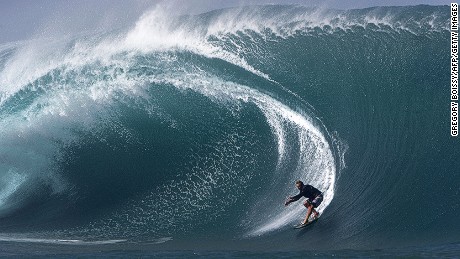 U.S. surfer Laird Hamilton rides a wave in Tahiti in 2013. Surfing is on a shortlist of sports that could be added to the 2020 Olympics in Tokyo.