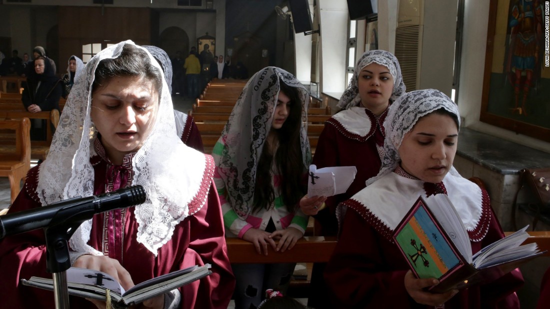 Displaced Assyrian women who fled their homes due to ISIS attacks pray at a church on the outskirts of Damascus, Syria, on Sunday, March 1. ISIS militants abducted at least 220 Assyrians in Syria. 