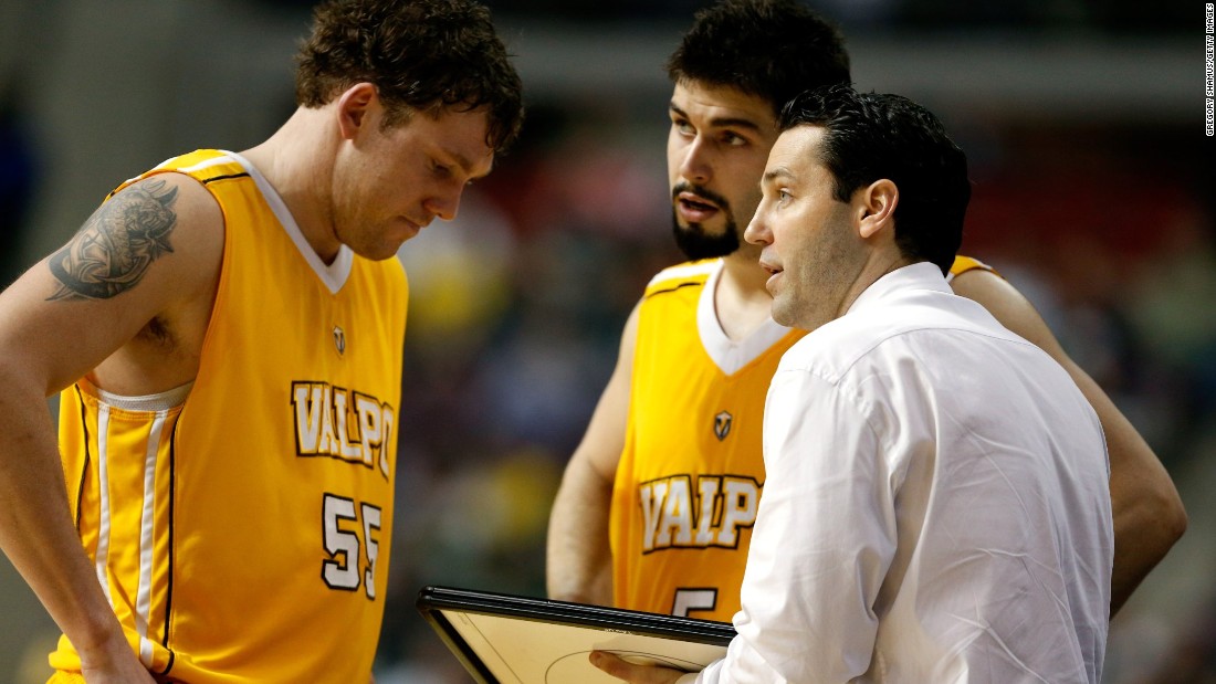 As a coach, Bryce Drew (drawing up a play for Kevin Van Wijk #55 and Bobby Capobianco #5) has led Valparaiso to its record number of wins in just his fourth season in charge.