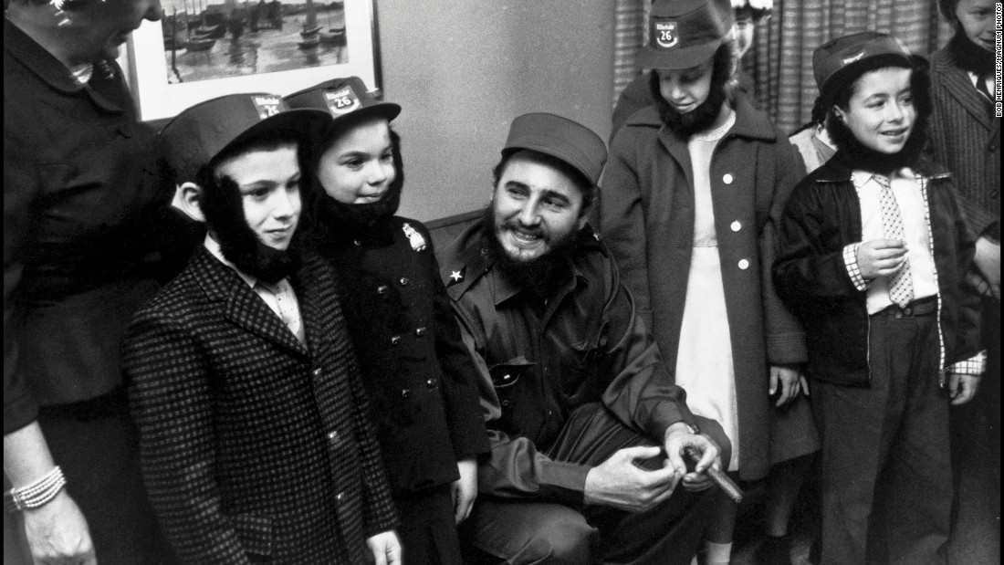 During a visit to New York in 1959, Fidel Castro spends time with a group of children.