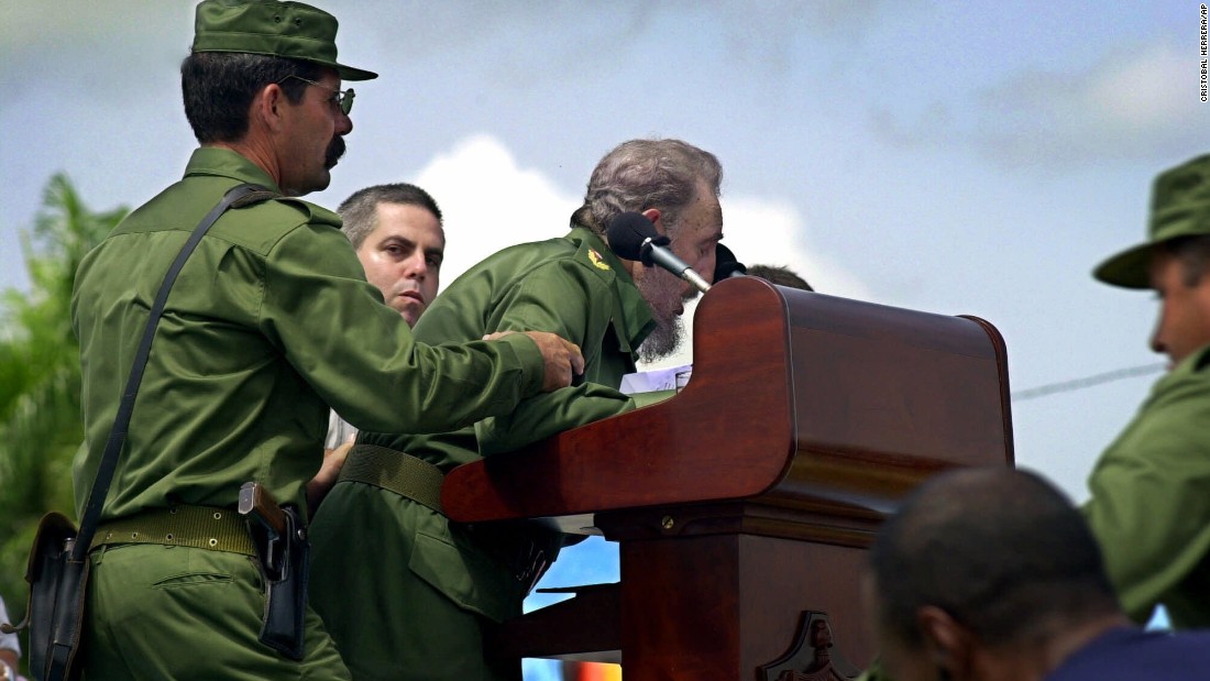 Castro is helped by aides after he appeared to faint while giving a speech in Cotorro, Cuba, in June 2001. He returned to the podium less than 10 minutes later to assure the audience he was fine and that he just needed to get some sleep.
