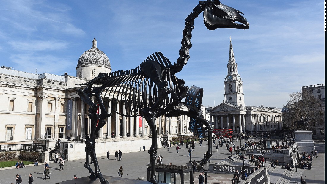 A &quot;Gift Horse&quot; isn&#39;t complete without a ribbon and Hans Haacke&#39;s creation comes with one which shows real-time updates from the London Stock Exchange. It completes the link between power, money and history which the artwork is meant to represent, say organizers.  