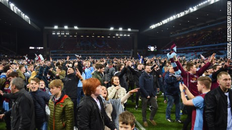 &quot;People tried to kiss me and were biting me&quot; -- pitch invasion mars FA Cup tie