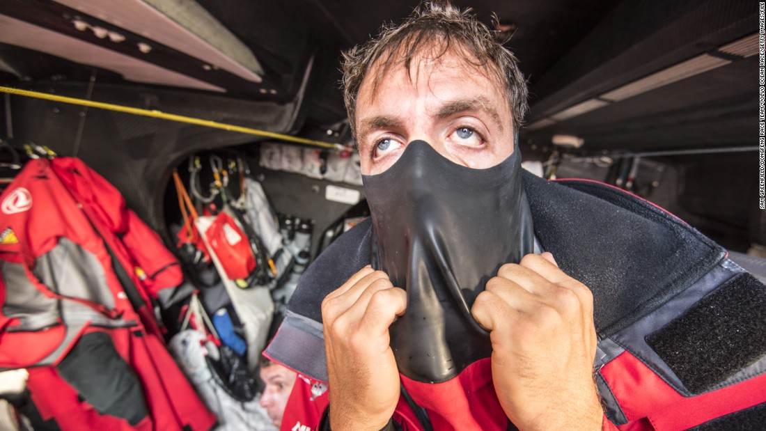Sailor Eric Peron pulls on waterproof gear during the Volvo Ocean Race -- a competition described as the &quot;Everest of Sailing.&quot;